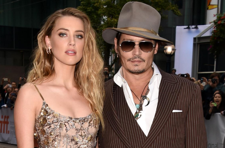 Amber Heard thotë se e do akoma Johnny Depp. Po, e lexuat mirë!